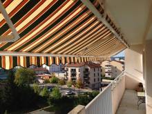 Vente et pose d'un store banne pour copropriété à Lyon