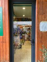 POSE D'UNE PORTE GRAND PASSAGE POUR UN FLEURISTE A VILLEURBANNE (69)