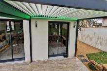 INSTALLATION D'UNE PERGOLA BIOCLIMATIQUE A LAMES ORIENTABLES A MIONS