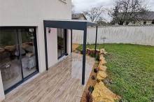 INSTALLATION D'UNE PERGOLA BIOCLIMATIQUE A LAMES ORIENTABLES A MIONS