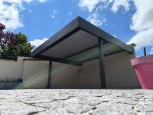 Installation d'un carport adossé en aluminium à Crachier 
