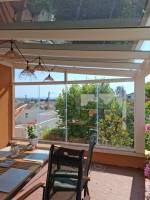 Pergola Pallazzo avec toit et parois coulissantes intégrées en verre à Genas